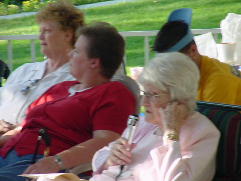 Sylvia Atchley and Sherry Haslam listen to Verna